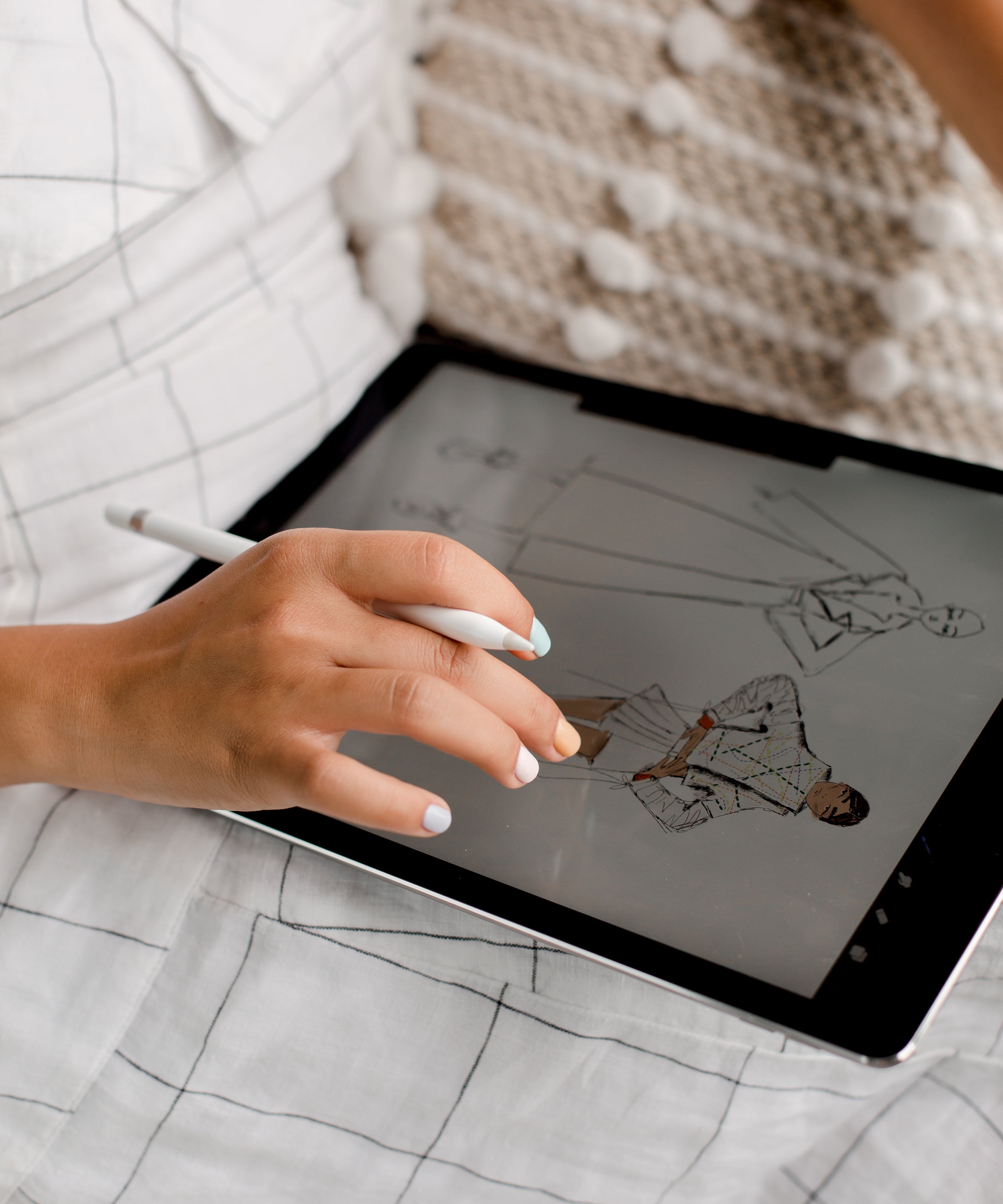 person-working-on-fashion-design-on-a-tablet.jpg